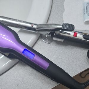 Purple Remington Flat Iton and Black Conair Hair Curler